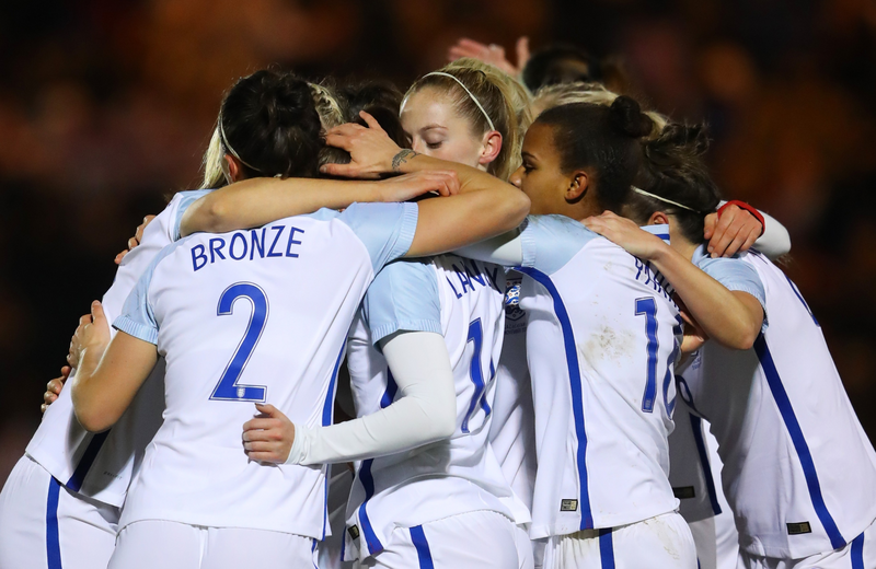 Melissa Lawley of England celebrates scoring the first goal 