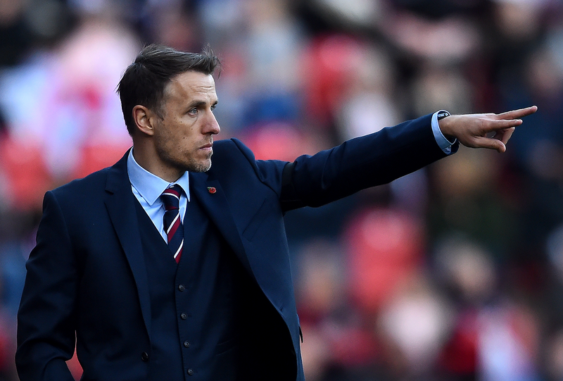 ROTHERHAM, ENGLAND - NOVEMBER 11:  Phil Neville manager of England gives his team instructions during the International Friendly match between England Women and Sweden Women at The New York Stadium on November 11, 2018 in Rotherham, England.  (Photo by Nathan Stirk/Getty Images)