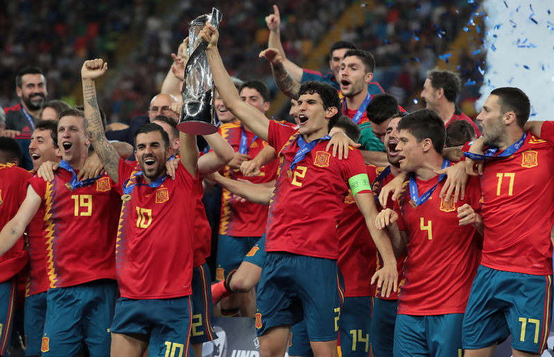 UDINE, ITALY - JUNE 30:  Spain players celebrate with the trophy the victory of the Uefa European Under-21 Championship at the end of the 2019 UEFA U-21 Final between Spain and Germany at Stadio Friuli on June 30, 2019 in Udine, Italy.  (Photo by Emilio Andreoli - UEFA/UEFA via Getty Images)