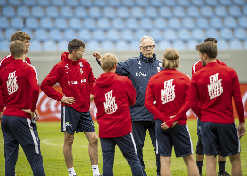 Norway Lars Lagerback speaks to his players.