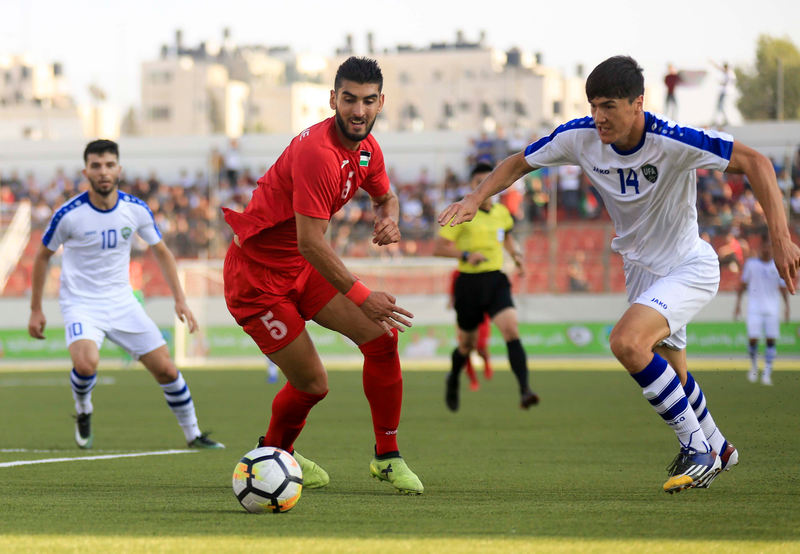 Palestine defender Yaser Hamed in action