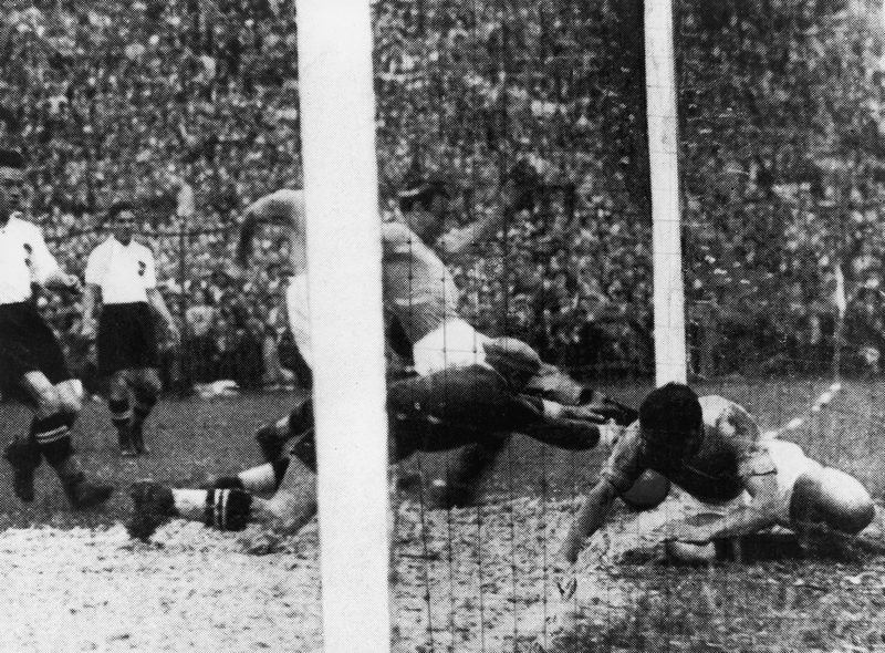 Enrico Guaita of Italy scores, ten minutes into his team's 1934 FIFA World Cup semi-final against Austria.