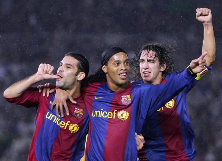 Ronaldinho celebrates scoring for Barcelona at Japan 2006