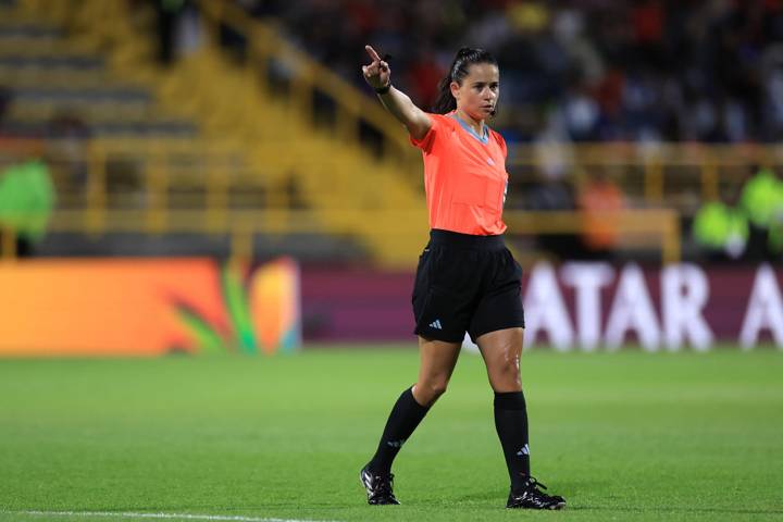 Referee Karen Hernandez gestures