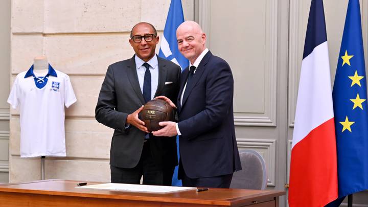 PARIS, FRANCE - MAY 21: FIFA President Gianni Infantino and French Football Federation President Philippe Diallo pose for a photo after signing a commemorative certificate as FIFA celebrates 120th anniversary of foundation in Paris at Élysée Palace on May 21, 2024 in Paris, France. (Photo by Harold Cunningham/FIFA)