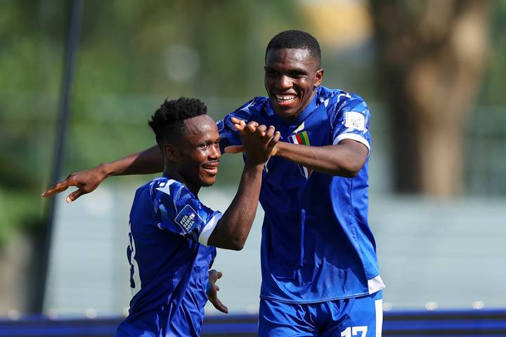 Godame Tieri of Central African Republic celebrates scoring his team's third goal with Yawanendji Christian Theodore