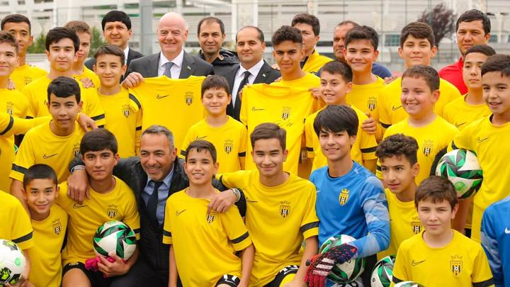 ASHGABAT, TURKMENISTAN - MAY 04: FIFA President Gianni Infantino and Football Federation of Turkmenistan (TFF) President Arslan Aynazarov (CR) pose for a group photo with youth players during the FIFA President Gianni Infantino visit to Turkmenistan on May 04, 2023 in Ashgabat, Turkmenistan. (Photo by TFF)