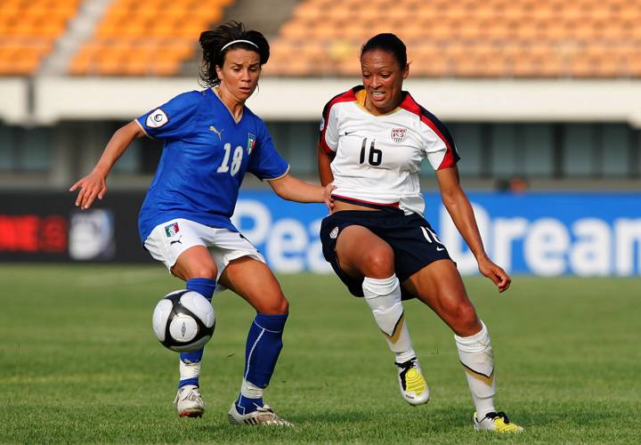 Angela Hucles of USA and Pamela Conti of Italy vie for the ball during the 2008 Queen Peace Cup match between the United States of America and Italy at the Suwon Sports Complex on June 19, 2008 in Suwon, South Korea