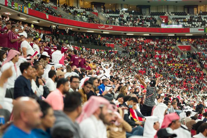 Fans cheer at the Al Bayt Stadium. Image courtesy of the Qatar 2022 Supreme Committee.