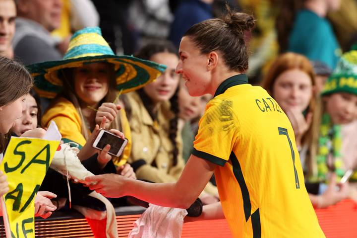 Steph Catley of the Matildas hands her boots to the crowd after the Women's International Friendly match between the Australia Matildas and Brazil 