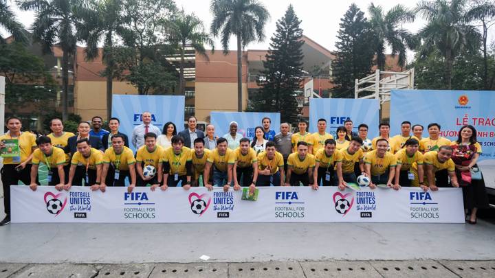 HANOI, VIETNAM - MARCH 22: A group photo during a FIFA Football for Schools workshop on March 22, 2024 in Hanoi, Vietnam. (Photo by Minh Hoang/FIFA)