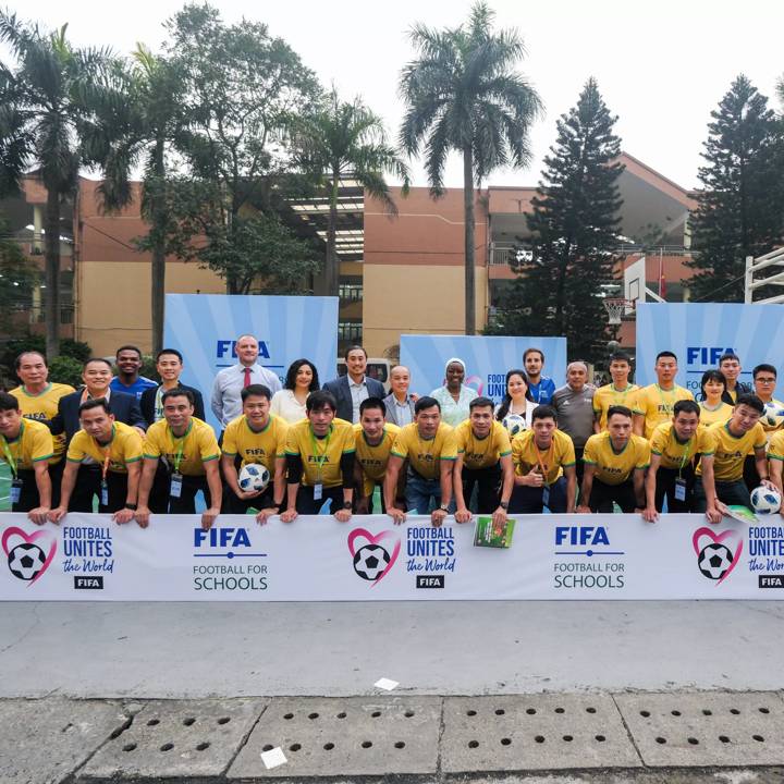 HANOI, VIETNAM - MARCH 22: A group photo during a FIFA Football for Schools workshop on March 22, 2024 in Hanoi, Vietnam. (Photo by Minh Hoang/FIFA)