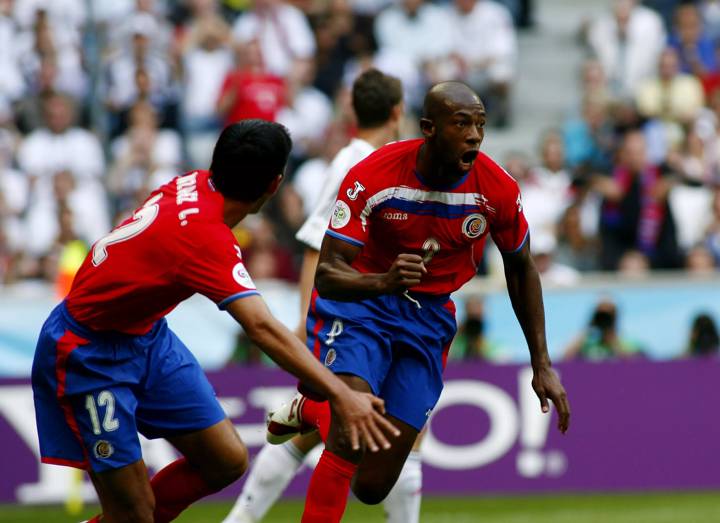 Paulo Wanchope of Costa Rica celebrates with Leonardo Gonzalez after scoring his country's first goal against Germany in Munich in June 2006