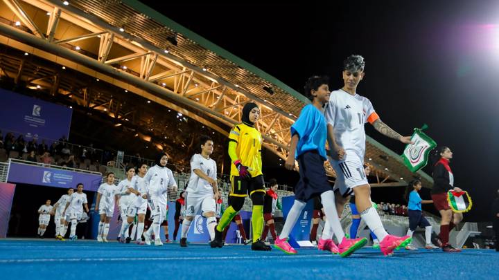 Iraq women's national football team walks into the pitch during the 2024 WAFF Women's Championship. Photo courtesy of WAFF