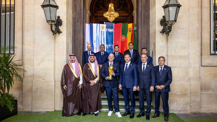 PARIS, FRANCE - JULY 29: (Back Row L-R) FIFA Secretary General Mattias Grafström, Argentine Football Association President Claudio Fabián Tapia, Royal Spanish Football Federation General Secretary Álvaro de Miguel Casanueva, Paraguayan Football Association President Robert Harrison, FIFA Council Member and President of the Uruguayan Football Association Ignacio Alonso, (Front Row L-R) FIFA Council Member and Saudi Arabian Football Federation President Yasser Al Misehal, Saudi Arabia Minster for Sport HRH Prince Abdulaziz bin Turki Al-Faisal, FIFA President Gianni Infantino, FIFA Vice-President and CONMEBOL President Alejandro Dominguez, FIFA Council Member and Royal Moroccan Football Federation President Fouzi Lekjaa and FIFA Council Member and Portugal Football Federation President Fernando Gomes pose for a group photo along with the FIFA World Cup Winner's Trophy during the FIFA World Cup 2030 and 2034 bid handover at FIFA's Paris office on July 29, 2024 in Paris, France. (Photo by Léo-Paul Ridet/FIFA)