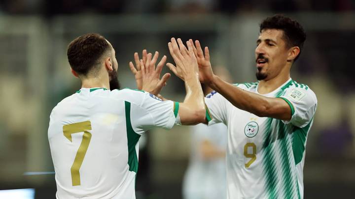 ALGIERS, ALGERIA - MARCH 22: Amine Ferid Ghouiri of Algeria (L) celebrates scoring his team's first goal with teammate Baghdad Bounedjah during the FIFA Series 2024 Algeria match between Algeria and Bolivia at Nelson Mandela Stadium on March 22, 2024 in Algiers, Algeria. (Photo by Richard Pelham - FIFA/FIFA via Getty Images)