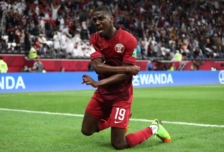 Almoez Ali of Qatar celebrates after scoring their team's first goal during the FIFA Arab Cup Qatar 2021 Group A match between Qatar 