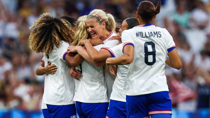 TOPSHOT - US' midfielder #03 Korbin Albert celebrates with teammates after scoring her team's second goal during the women's group B football match between Australia and the USA of the Paris 2024 Olympic Games at the Marseille Stadium in Marseille on July 31, 2024. (Photo by Pascal GUYOT / AFP) (Photo by PASCAL GUYOT/AFP via Getty Images)