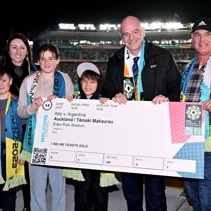 AUCKLAND, NEW ZEALAND - JULY 24: FIFA President Gianni Infantino poses with the 1500000 FIFA Women's World Cup 2023 ticket holder during the FIFA Women's World Cup Australia & New Zealand 2023 Group G match between Italy and Argentina at Eden Park on July 24, 2023 in Auckland / Tamaki Makaurau, New Zealand. (Photo by Harold Cunningham/FIFA)