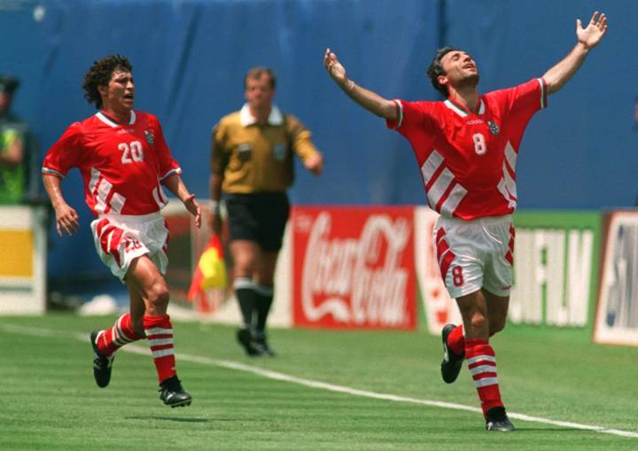 Balakov, left, of Bulgaria runs to congratulate teammate Hristo Stoitchkov who celebrates after scoring the equalizer against Germany during the 1994 World Cup Quarterfinals at the Giants Stadium in East Rutherford, New Jersey