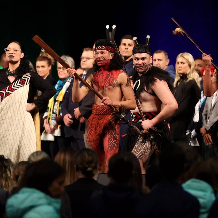 AUCKLAND, NEW ZEALAND - JULY 15: Performers perform a Powhiri as teams arrive for the FIFA Women's World Cup Australia & New Zealand 2023 at Spark Arena on July 15, 2023 in Auckland, New Zealand. (Photo by Fiona Goodall - FIFA/FIFA via Getty Images)