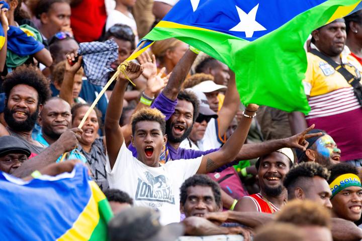 Solomon Islands fans celebrate during the 2023 Pacific Games