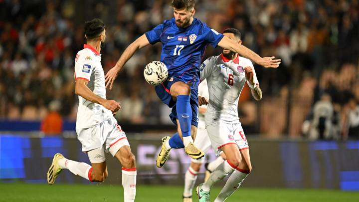 CAIRO, EGYPT - MARCH 23: Bruno Petkovic of Croatia is challenged by Hamza Jelasi and Dylan Bronn of Tunisia during the FIFA Series 2024 Egypt match between Tunisia and Croatia at the Cairo International Stadium on March 23, 2024 in Cairo, Egypt. (Photo by Tullio Puglia - FIFA/FIFA via Getty Images)