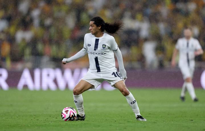 Dylan Manickum of Auckland City runs with the ball during the FIFA Club World Cup match between Al Ittihad FC and Auckland City FC at King Abdullah Sports City