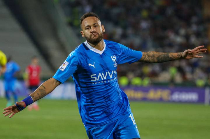 Al-Hilal's Brazilian forward #10 Neymar reacts after scoring