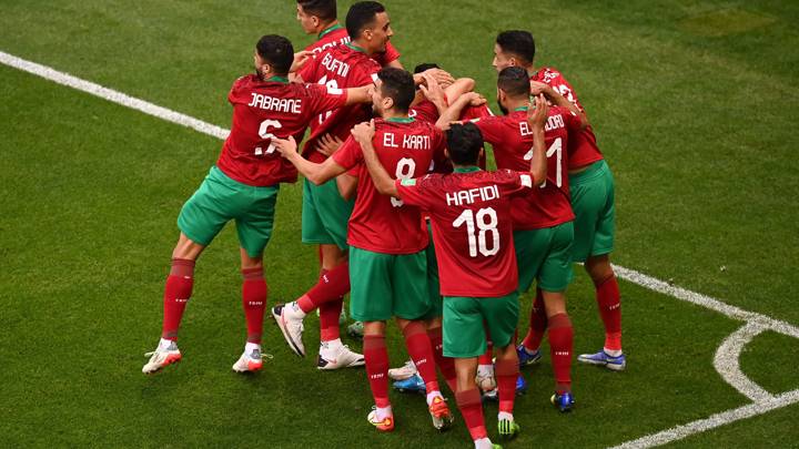 DOHA, QATAR - DECEMBER 04: Benoun Badr of Morocco (obscured) celebrates with teammates after scoring their team's second goal during the FIFA Arab Cup Qatar 2021 Group C match between Jordan and Morocco at Ahmad Bin Ali Stadium on December 04, 2021 in Doha, Qatar. (Photo by David Ramos - FIFA/FIFA via Getty Images)