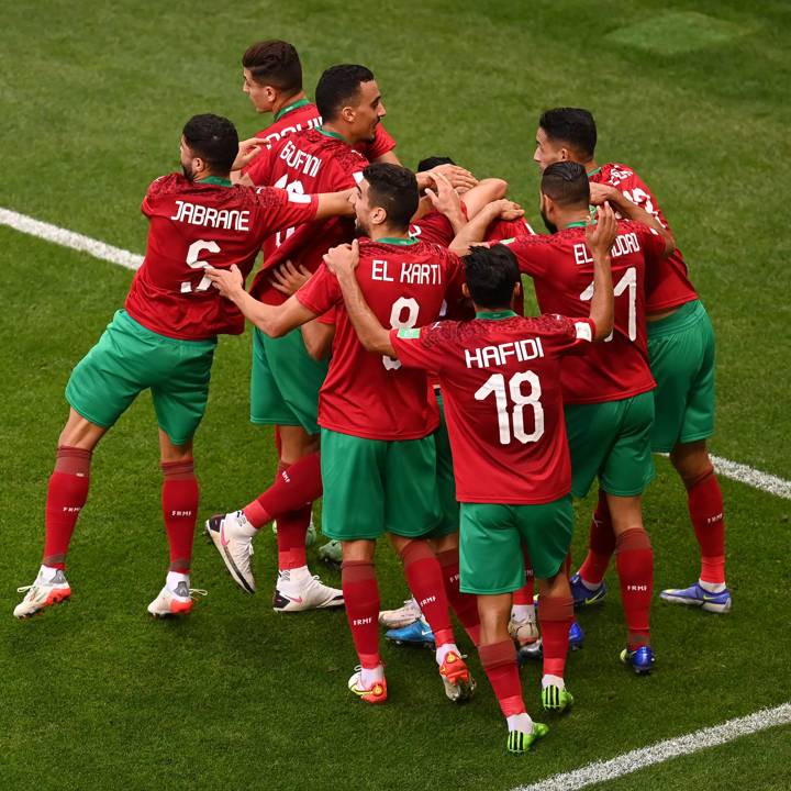 DOHA, QATAR - DECEMBER 04: Benoun Badr of Morocco (obscured) celebrates with teammates after scoring their team's second goal during the FIFA Arab Cup Qatar 2021 Group C match between Jordan and Morocco at Ahmad Bin Ali Stadium on December 04, 2021 in Doha, Qatar. (Photo by David Ramos - FIFA/FIFA via Getty Images)