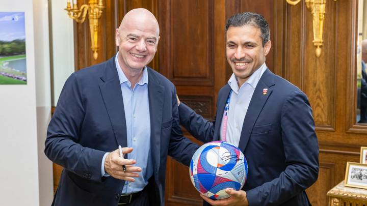 PARIS, FRANCE - JULY 28: FIFA President Gianni Infantino and Qatar Football Association President Jassim Rashid Al Buenain pose with an Olympic Games Paris 2024 official match ball signed by the FIFA President during a meeting at FIFA's Paris office on July 28, 2024 in Paris, France. (Photo by Léo-Paul Ridet/FIFA)