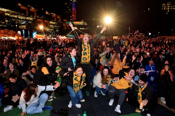 Fans watch the Round of 16 match between Australia and Denmark at the FIFA Women's World Cup Fan Festival 