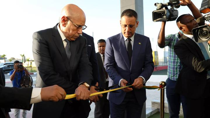 NOUAKCHOTT, MAURITANIA - NOVEMBER 23:  Mauritania President Mohamed Ould Ghazouani and Mauritanian Football Association President Ahmed Yahya ribbon cutting during the visit of the Mauritania President Mohamed Ould Ghazouani to the FFRIM headquarters on November 23, 2023 in Nouakchott, Mauritania. (Photo by Amadou Sy/FIFA)