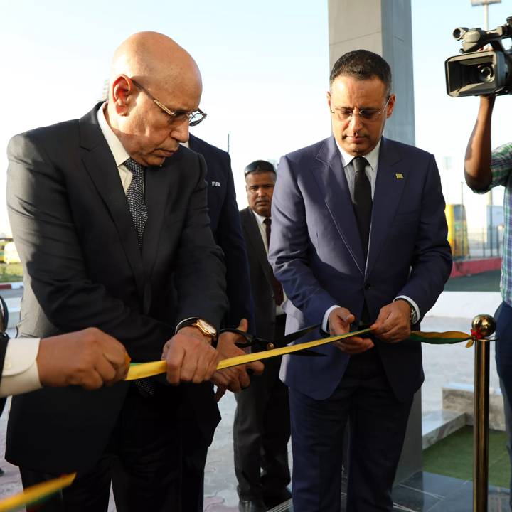 NOUAKCHOTT, MAURITANIA - NOVEMBER 23:  Mauritania President Mohamed Ould Ghazouani and Mauritanian Football Association President Ahmed Yahya ribbon cutting during the visit of the Mauritania President Mohamed Ould Ghazouani to the FFRIM headquarters on November 23, 2023 in Nouakchott, Mauritania. (Photo by Amadou Sy/FIFA)