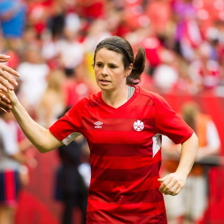 England v Canada Quarter Final - FIFA Women's World Cup 2015
VANCOUVER, BC - JUNE 27: Diana Matheson #8 of Canada high fives fans prior to the start of the FIFA Women's World Cup Canada 2015 Quarter Final match between the England and Canada June, 27, 2015 at BC Place Stadium in Vancouver, British Columbia, Canada. (Photo by Rich Lam/Getty Images)