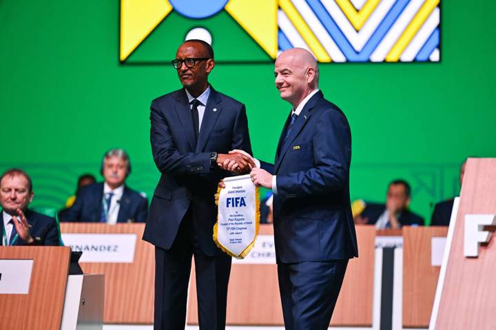 FIFA President Gianni Infantino and His Excellency Paul Kagame, President of the Republic of Rwanda exhange gifts during the 73rd FIFA Congress at BK Arena