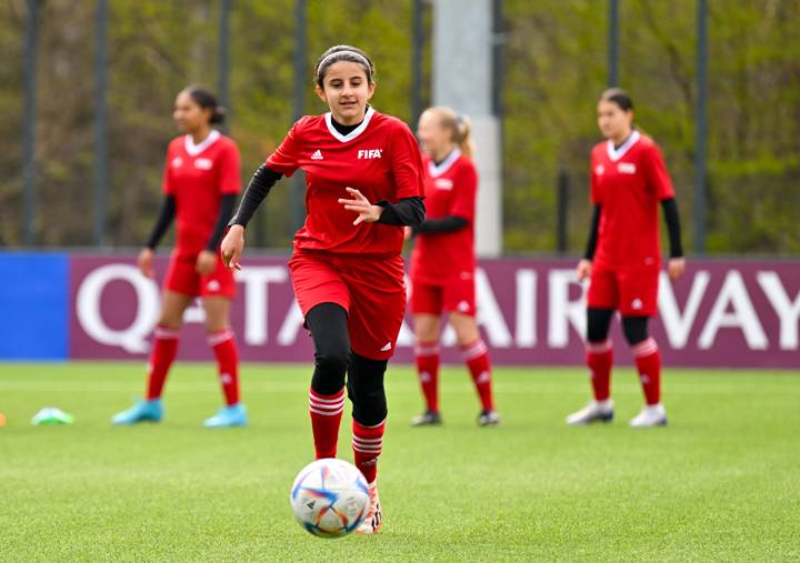 Girls playing football at the Home of FIFA