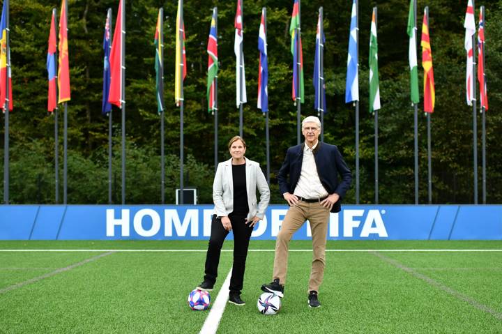 FIFA Women’s Technical Advisory Group Lead Jill Ellis and FIFA Chief of Global Football Development Arsene Wenger on the pitch