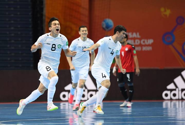 Khusniddin Nishonov of Uzbekistan celebrates scoring