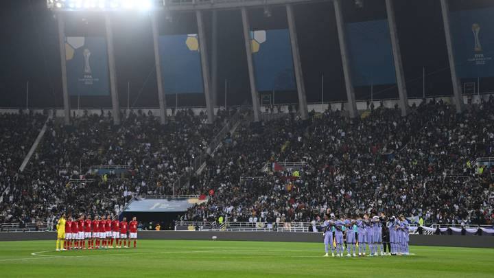 RABAT, MOROCCO - FEBRUARY 08: Players line up on the pitch for a minutes silence in memory of the victims of an earthquake in Turkey and Syria prior to the FIFA Club World Cup Morocco 2022 Semi Final match between Al Ahly and Real Madrid CF at Prince Moulay Abdellah on February 08, 2023 in Rabat, Morocco. (Photo by David Ramos - FIFA/FIFA via Getty Images)