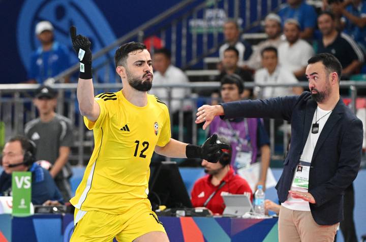 ANDIZHAN, UZBEKISTAN - SEPTEMBER 15: Feras Abuksheam of Libya celebrates scoring his team's third goal during the FIFA Futsal World Cup Uzbekistan 2024 match between New Zealand and Libya at Andijan Universal Sports Complex on September 15, 2024 in Andizhan, Uzbekistan. (Photo by Anvar Ilyasov - FIFA/FIFA via Getty Images)