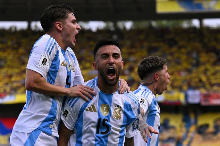 Argentina's forward Nicolas Gonzalez (C) celebrates with teammates forward Julian Alvarez (L) and midfielder Enzo Fernandez after scoring his team's first goal during the 2026 FIFA World Cup South American qualifiers football match between Colombia and Argentina, at the Metropolitano Roberto Meléndez stadium in Barranquilla, Colombia, on September 10, 2024. (Photo by Raul ARBOLEDA / AFP) (Photo by RAUL ARBOLEDA/AFP via Getty Images)