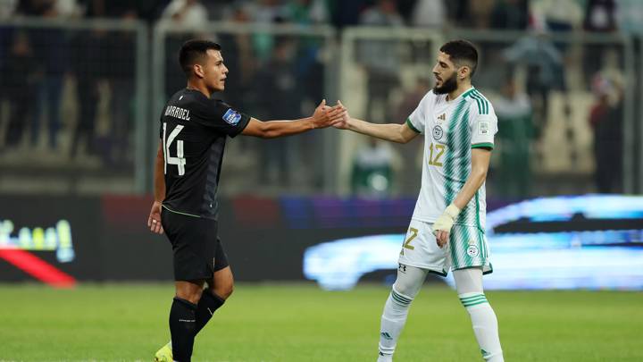 ALGIERS, ALGERIA - MARCH 22: Moises Villarroel Angulo of Bolivia and Yassine Benzia of Algeria interact after the FIFA Series 2024 Algeria match between Algeria and Bolivia at Nelson Mandela Stadium on March 22, 2024 in Algiers, Algeria. (Photo by Richard Pelham - FIFA/FIFA via Getty Images)