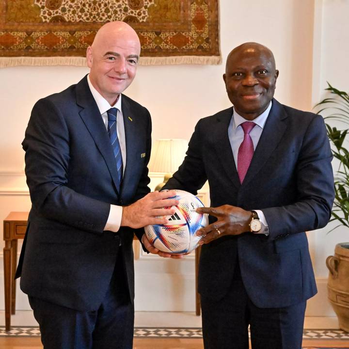 DOHA, QATAR - DECEMBER 04: FIFA President Gianni Infantino with ILO Director-General Gilbert F. Houngbo during a FIFA President Gianni Infantino meeting with ILO Director-General Gilbert F. Houngbo on December 04, 2022 in Doha, Qatar. (Photo by Harold Cunningham/FIFA)