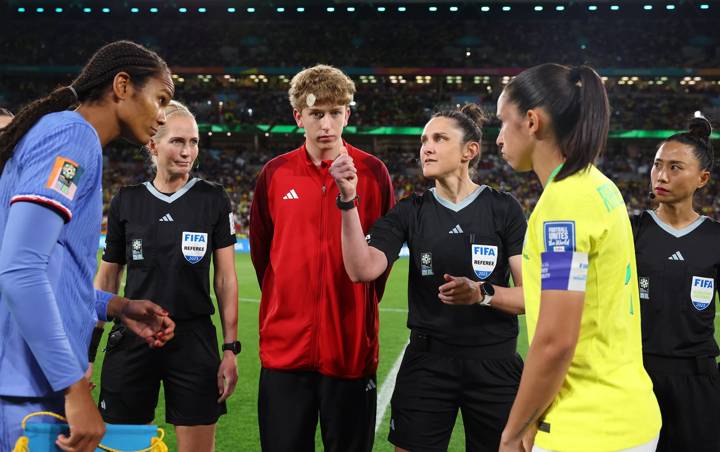 Captains Wendie Renard of France and Rafaelle of Brazil attend the coin toss prior to the France and Brazil match at Brisbane Stadium