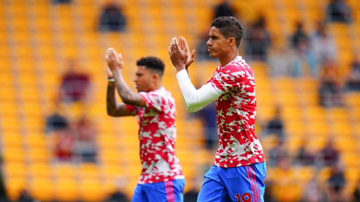 Photo by Javier Garcia/Shutterstock (12375673e) Raphael Varane of Manchester United, ManU warms up alongside Jadon Sancho Wolverhampton Wanderers v Manchester United, Premier League, Football, Molineux, Wolverhampton, UK - 29 August 2021