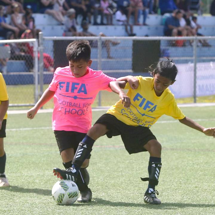 HARMON, GUAM – MAY 07: Merizo Martyrs Memorial School and Inarajan Elementary School teams play a match during the FIFA Football 4 Schools Festival Jamboree at the Guam Football Association National Training Center on May 7, 2022 in Harmon, Guam. (Photo by Samantha Bautista/Guam Football Association)