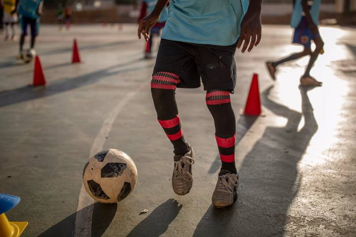 Children play football