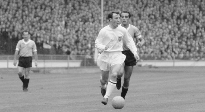 England striker Jimmy Greaves outpaces a Uruguay defender during the 1966 FIFA World Cup 